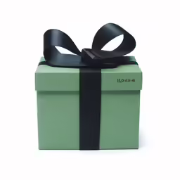 green gift box with black ribbon on a white background