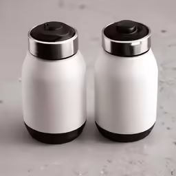 two jars are shown side by side on a gray surface