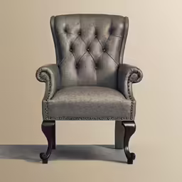a vintage chair with antique style buttons sits against a beige wall