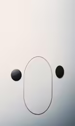 a mirror and some circles placed on the wall