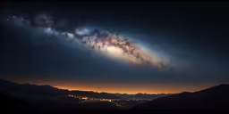 the night sky and stars over the mountains and sky