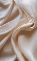 white fabric textured with shiny white material