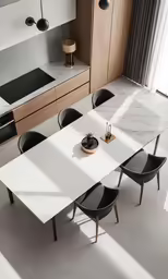 an elegant kitchen with modern furniture and wooden cabinetry