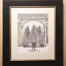 a person walking under an arch in the snow