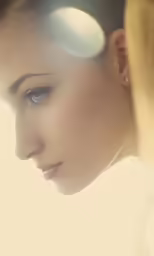 a woman is looking back as she looks into the distance