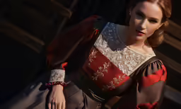 an image of a woman in a dress posing for the camera
