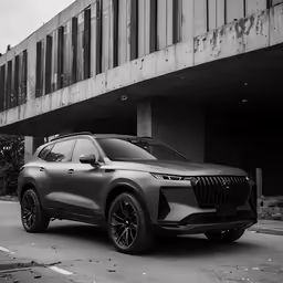 the new bmw xc is parked under a bridge