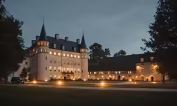 a very large building with some lights at night