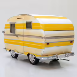 an old trailer is painted yellow with a white stripe