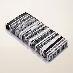 an empty book is in a gray and black striped pattern