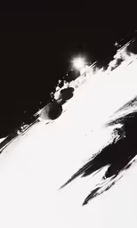 a man riding a snowboard down a snow covered slope