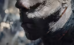 a close up shot of a person with a goatee and beard