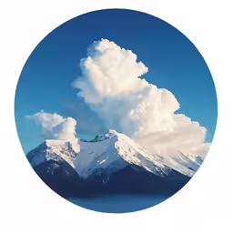 round photo of clouds and snow capped mountains