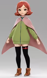 a little girl in a green dress with a pink cape