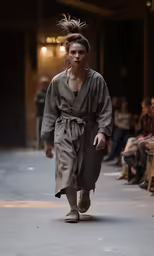 a women is walking down the runway