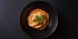 a plate of food with apples on top