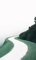 a winding road in the middle of the hills
