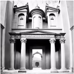 an ancient building with columns and arches