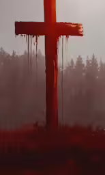 a bloodied cross in front of trees in the fog