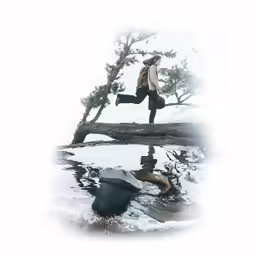 a young man is crossing a log in the water