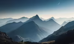 a view of the mountains and valleys near a house