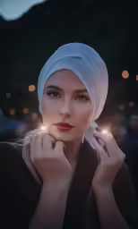 a woman holding onto her small crystal ball