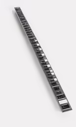 a metal shelf with many small electrical switches