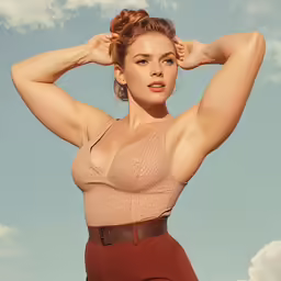 a woman with a top that has an attached strap