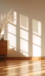 an empty living room with white walls and wooden furniture