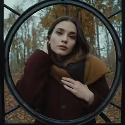 the girl is posing in the circular circle
