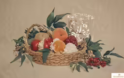 an arrangement of different kinds of fruit in a basket
