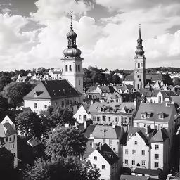 view of a city with a steeple and towers