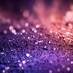 a purple and black background with drops of rain