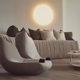 a room with a couch and some chairs
