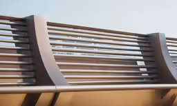 the bench is made out of concrete and metal