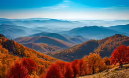 mountain ranges in fall colors with the great smoky mountains below