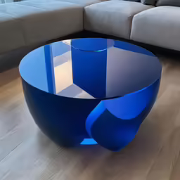 an unusual coffee table on wooden floors in a living room