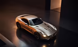 a white and gold mercedes sports car on a shiny surface