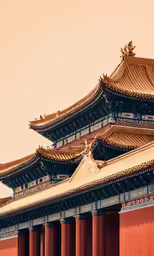 a close - up photo of several ornate oriental designs on the building