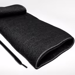 an empty notebook sleeve is folded and ready to be used