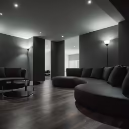 a couch sitting on top of a hard wood floor