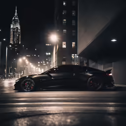 a black car is parked in the street