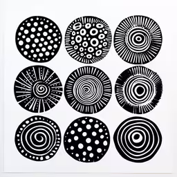 a print of different shapes and sizes,the circles are black and white with dots