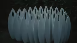 several large white pieces of plastic on the ground
