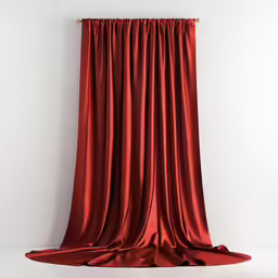 a red silk curtain hanging on the wall