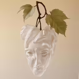 a face planter hanging from the side of a wall