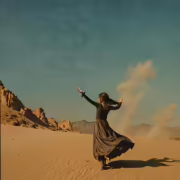 a person in the middle of the desert is playing