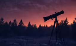 a telescope sitting on top of a tripod