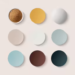 nine white, green, and beige dots are arranged against a light - colored backdrop
