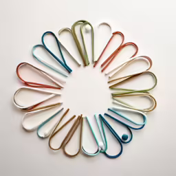 a circular of different colored plastic paper clips